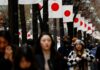 Japan business sentiment improves slightly, BOJ tankan shows