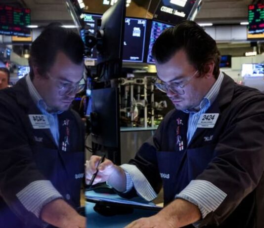 Wall St rebounds, dollar stalls as markets digest Fed’s slowdown signal