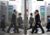 BOJ sees widening wage hikes, signals chance of near-term rate hike