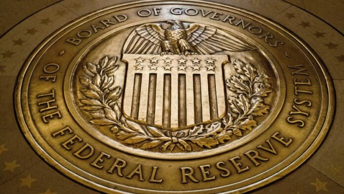 Fed leaves rates unchanged, sees no hurry to cut again