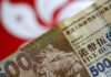 Hong Kong sees no need to change US dollar-pegged currency system