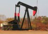 Oil prices give up early gains as uncertainty reigns over supply