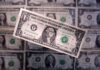 Dollar rises as Fed signals it is in no rush to cut rates