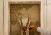 Gold scales record peak as Fed signals two rate cuts in 2025