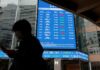 Most Asian markets track Wall Street rally after Fed rate signals
