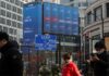 Shares cling to hopes for tariff relief, bitcoin jumps
