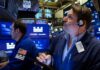 US stocks end down on economic worry; oil up on Middle East tensions