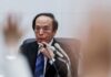 BOJ to keep raising rates if economy improves, Governor Ueda says