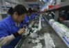 China factory output slows but consumption offers bright spot