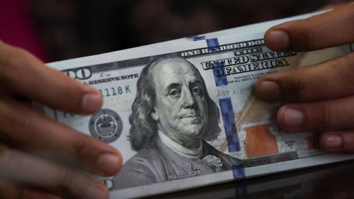 Dollar drops on Middle East optimism, euro highest since 2021