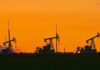 Oil inches up on geopolitical concerns and weaker dollar