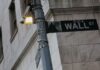 Stocks choppy as Fed leans hawkish, oil climbs on Mideast uncertainty