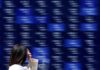 Japan stocks jump, bonds slide after Trump says trade deal reached