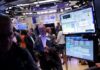 Wall St futures hit record peaks as Meta, Microsoft results get AI boost