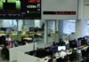 Asian shares rise, dollar defensive after mild inflation data