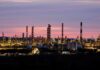 Oil little changed after hitting one-week low, oversupply concerns linger