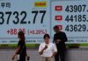 Asia stocks scale new highs, dollar tentative as investors eye Fed cut