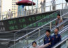 Asian markets drop as US data, new tariff threats dent sentiment