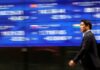 Asian markets fluctuate ahead of expected US rate cut