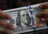 US dollar retreats as inflation runs warm, jobless claims tick higher