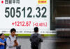Asian markets cool as Trump begins Japan visit