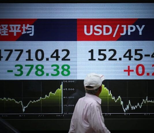 Asian stocks pare tariff-led losses, Tokyo hit by political turmoil