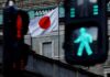 BOJ may slightly revise up this year’s growth forecast, sources say