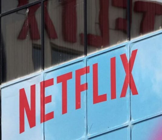 Exclusive-Netflix taps bank to explore bid for Warner Bros Discovery