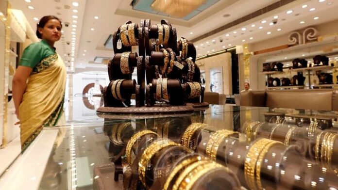 Gold takes a breather after safe-haven demand fuels record run