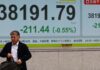 Tokyo stocks hit new record as Asian markets extend global rally