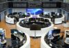 US, European stocks hit record highs as investors shrug off US shutdown impact