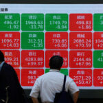 Asian markets tumble as tech bubble fears grow