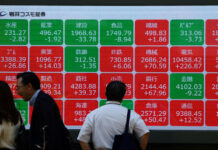 Asian markets tumble as tech bubble fears grow