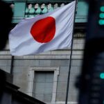 BOJ policymaker calls for raising interest rates