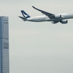 Cathay Pacific to buy back shares from Qatar Airways for $897.3 million