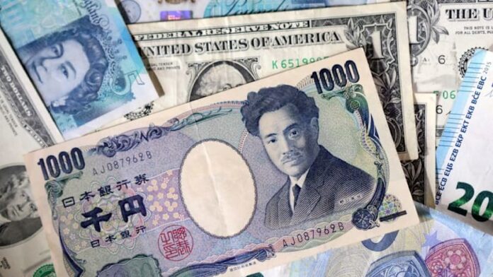 Dollar hits fresh 9-1/2-month high versus yen, Japan fiscal policy, US data in focus