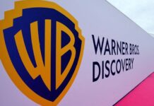 Exclusive-Comcast hires bankers to explore bid for Warner Bros Discovery