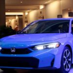 Honda cuts annual operating profit after posting Q2 drop