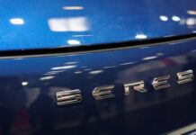 Huawei’s Chinese EV partner Seres’ shares fall nearly 2% in Hong Kong trading debut