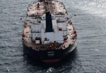 Oil up as investors balance sanctions risks, oversupply worries