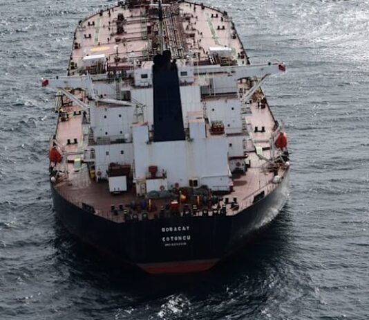 Oil up as investors balance sanctions risks, oversupply worries