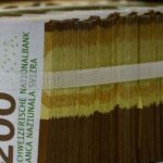 Safe-haven Swiss franc gains, pound drops on UK budget shift