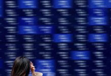 Stocks fall with bond prices; hopes fade for rate cuts as US reopens to murky economic data