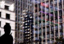 Stocks rise, dollar falls with labor market, US government reopening, tech valuations in focus