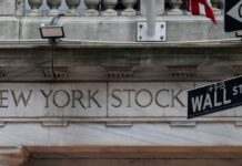 Wall Street ends sharply lower, Treasury yields slip as investors eye Nvidia results