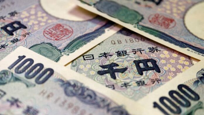 Yen dips as rate hike talk fades; sterling lifted by UK budget