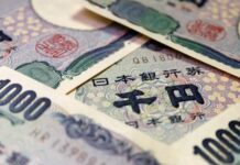 Yen dips despite rate hike talk; sterling lifted by UK budget