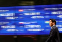 Asia shares ease as Fed cut priced, guidance uncertain