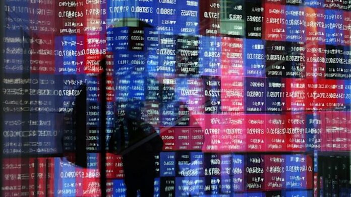 Asia stocks join Wall St rally, brace for BOJ hike