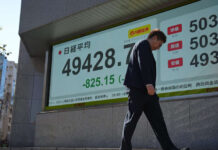 Asian markets mixed as traders eye US data ahead of Fed decision